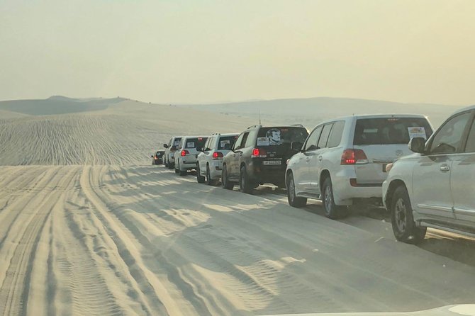4 Hour Desert Safari, Camel Ride & Inland Sea Beach - Sandboarding and the roller-coaster dune bash