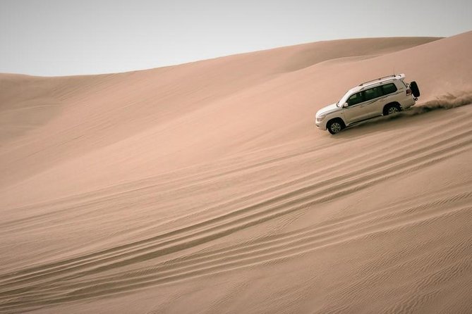 Desert Combo safari, Camel ride, Quad Bike and Dune Bashing(ALL INCLUSIVE) - A five-minute camel ride, tea, and photo stop