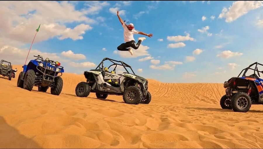 Desert Safari, QuadBike,Dune buggy, Sandboarding & CamelRide - A short camel ride with cultural context