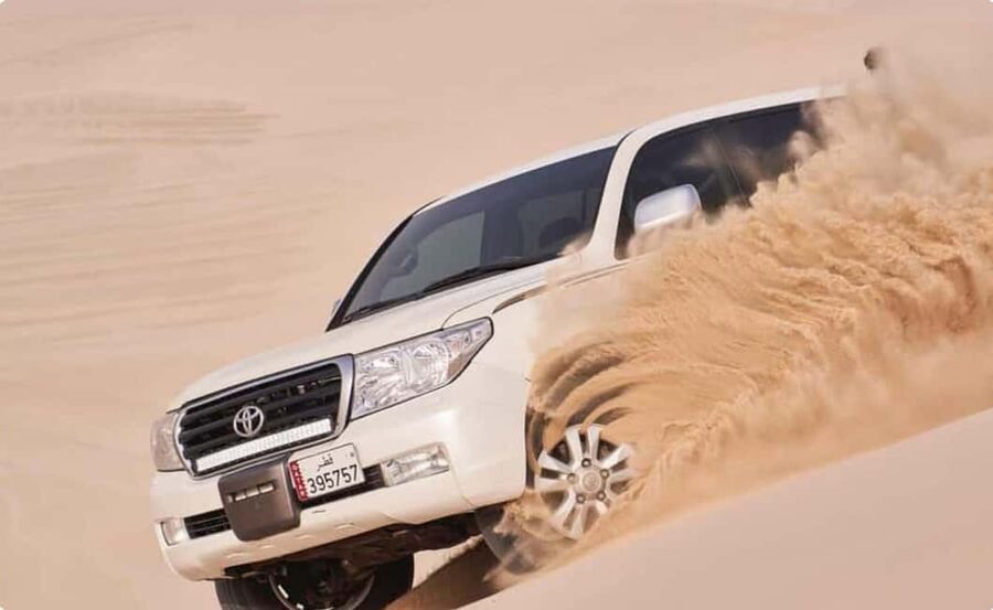 Doha: ATV, Quad or Buggy, Dune Bashing, Camel & Sandboarding - Dune bashing in a Land Cruiser