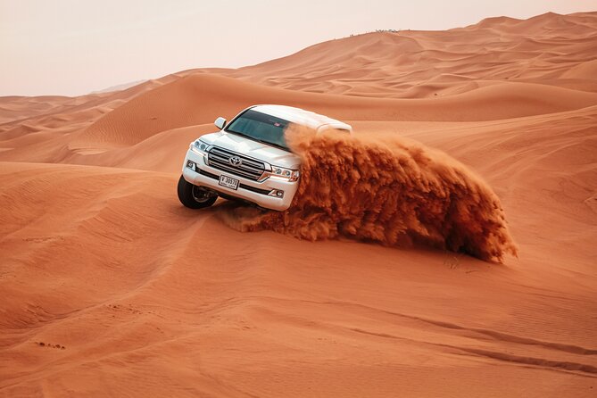 Doha Desert Adventure, Sandboarding, Dune Bashing,Inland Sea Tour - The 4WD ride across Sealine Sand Dunes