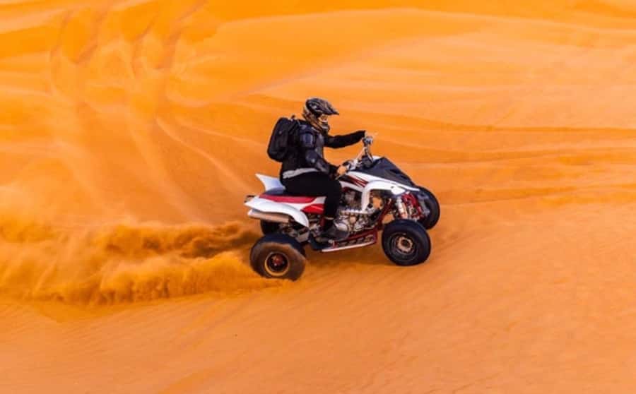 Doha: Desert All Activities ATV Quad Bike, Dune Bashing - Dune bashing toward the Inland Sea