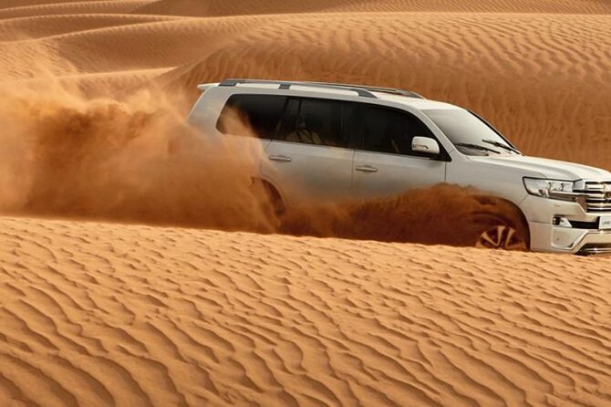 Doha Desert Quad Bike adventure with group, and Sand dune Driving - Camel contact and a Bedouin-style moment