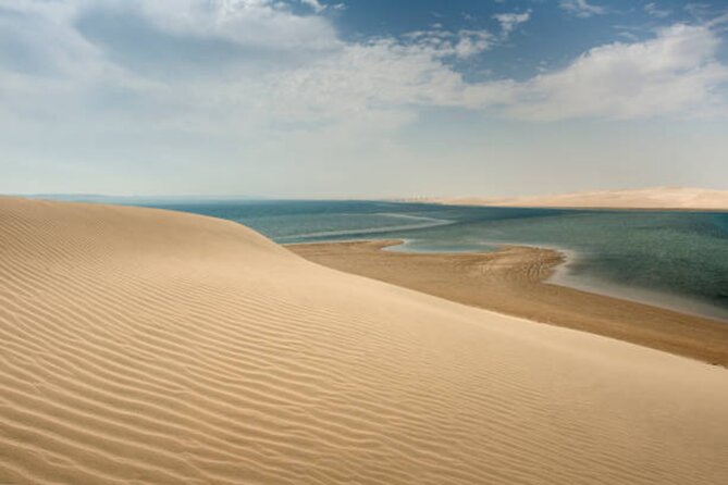 Doha Desert Quad Bike adventure with group, and Sand dune Driving - Sunset and the changing desert light