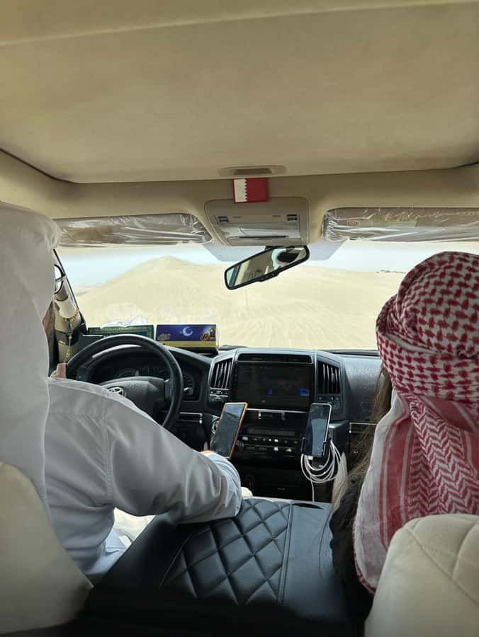 Doha: Desert Safari, Adventure, Sandboarding and Camel Ride - Sandboarding down soft golden slopes