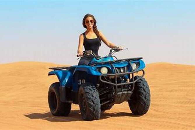 Doha Desert Safari Camel Ride Dune Bashing and ATV Bike - ATV biking and sandboarding at the Inland Sea