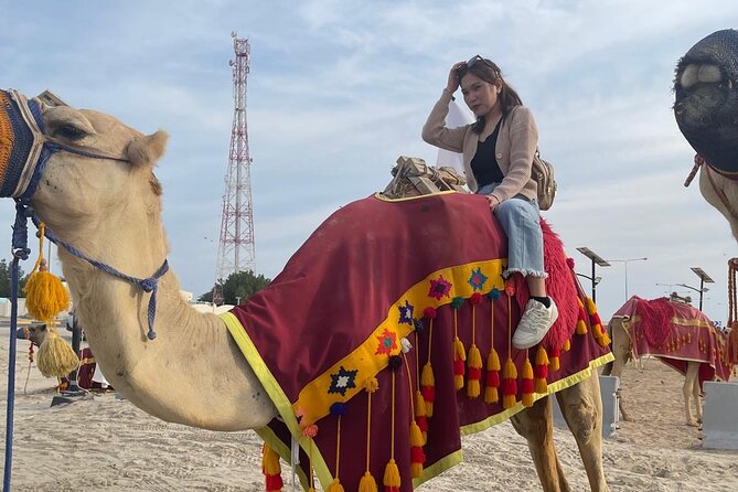 Doha Desert Safari Camel Ride Dune Bashing and ATV Bike - Camel riding for a slower desert moment