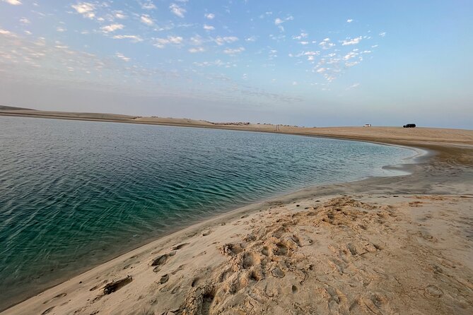 Doha: Desert Safari | Camel ride | Sand-boarding | Quad Biking - Sand-boarding on Qatar’s dunes