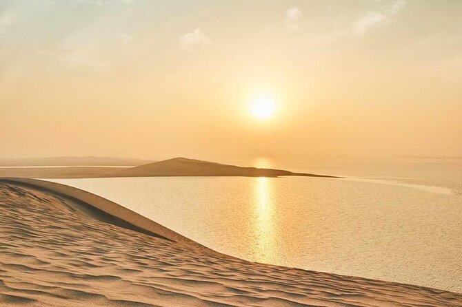 Doha: Desert Safari | Camel ride | Sand-boarding | Quad Biking - Khor Al Udeid, where sand meets the sea