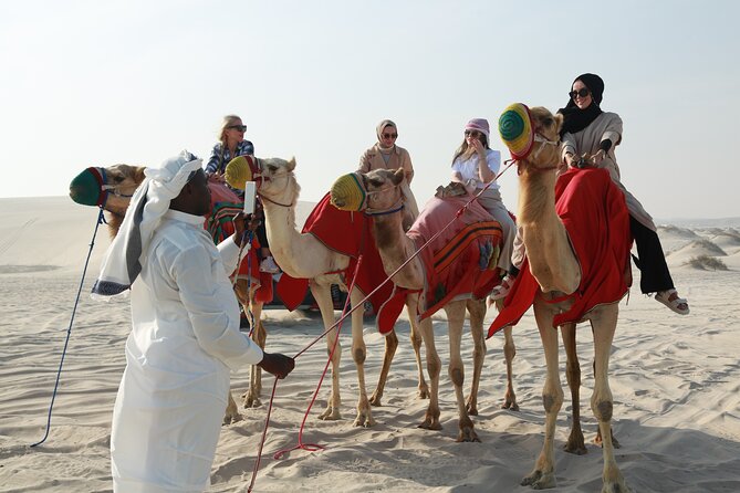 Doha Desert Safari Dune Bashing Camel Ride Sandboarding - The Inland Sea, where dunes reach the Gulf