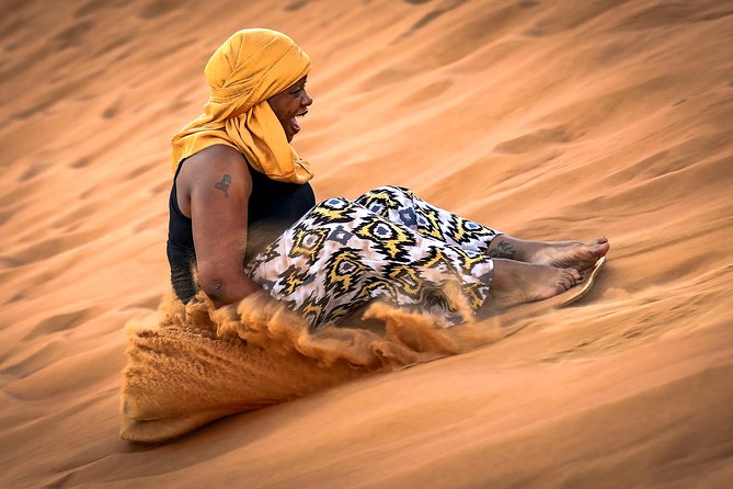 Doha Desert Safari: Dunebashing, Camel, Sandboarding & Inland Sea - Sandboarding Without Fancy Equipment