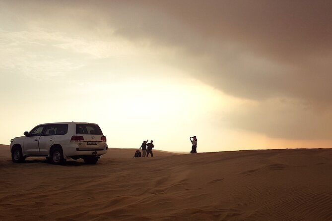 Doha: Desert Safari With Quad bike ,Camel Ride And Sand Boarding - Falcon viewing and the cost of photographs