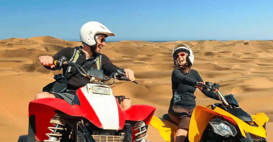 Doha: DesertSafari with Quad Bike, Camel Ride & Sandboarding - Khor Al Adaid, where sand meets sea