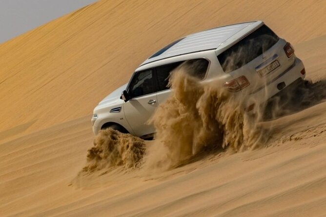 Doha Half Day Desert Safari Dune Bashing Camel Ride Sandboarding - A quick camel ride, Bedouin tents, and tea