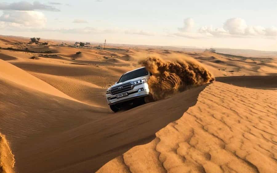 Doha: Half Day Desert Safari, Dune Bashing, Camel Ride - Sandboarding and the sharp turn into dune bashing