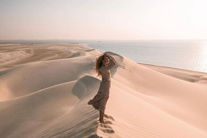 Doha Half Day Desert Safari Dune Bashing CamelRide & Sandboarding - From Doha to Qatar’s Open Desert
