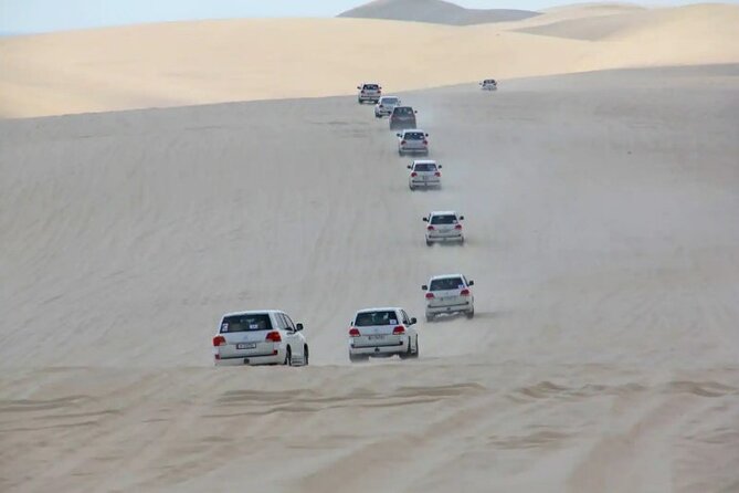 Doha Half Day Desert Safari Dune Bashing CamelRide & Sandboarding - Dune Bashing on the Way to the Inland Sea