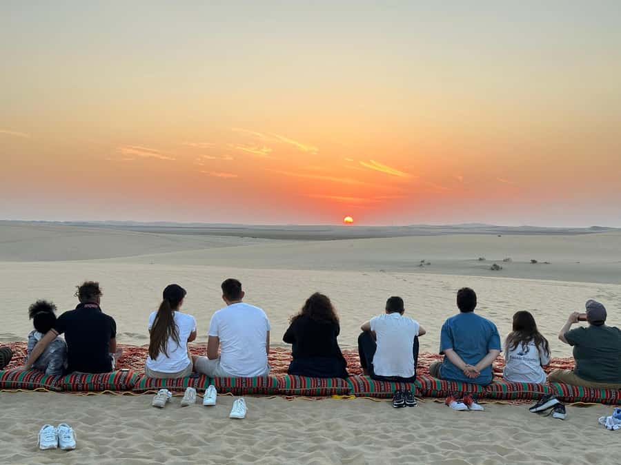Doha: Half-Day Desert Safari, Quad Bike, Camels & Inland Sea - Sandboarding is simple, rewarding and harder than it looks