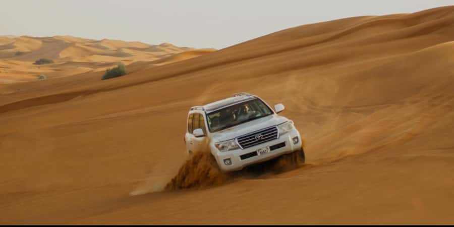 Doha: Half Day Desert Safari With Camel Ride & Sand Boarding - Leaving Doha for Mesaieed’s Red Dunes
