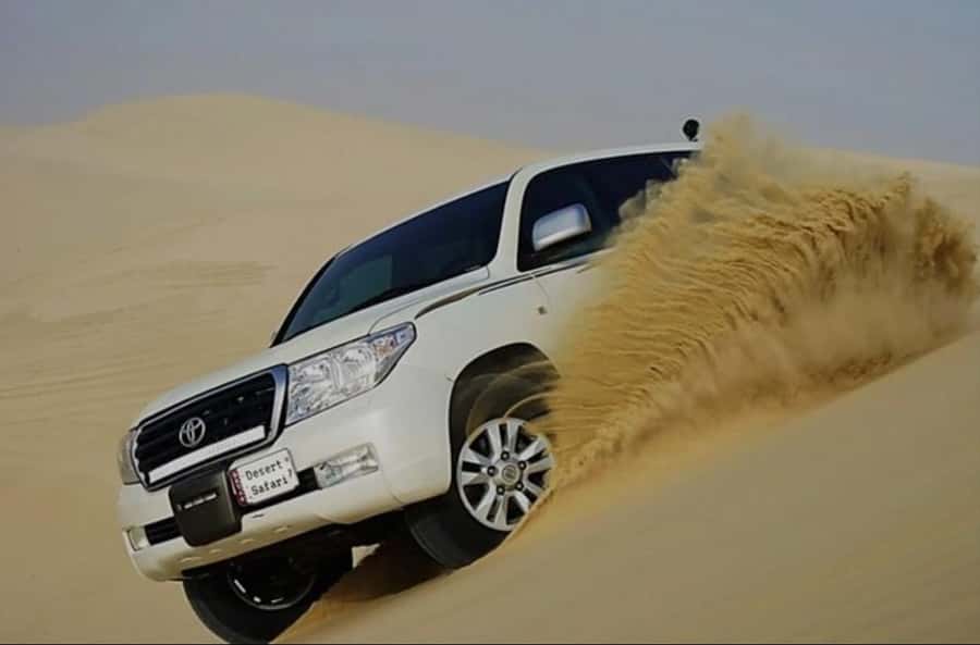 Doha: Half Day Desert Safari With Camel Ride & Sand Boarding - What the 45-Minute Dune Drive Feels Like