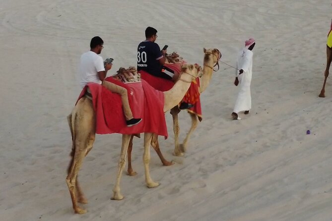 Doha-Half Day Safari with Quad Bike ATV/Camel Ride/sandboard - Reaching Sealine Beach by private 4WD