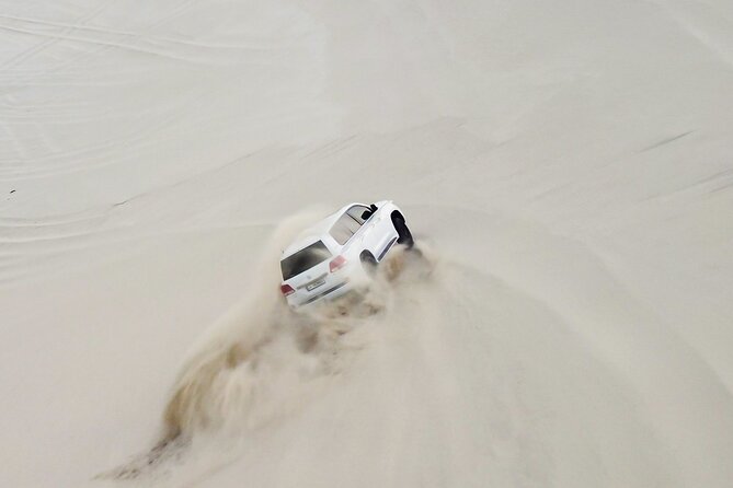 Doha-Half Day Safari with Quad Bike ATV/Camel Ride/sandboard - Quad biking on a 250cc track
