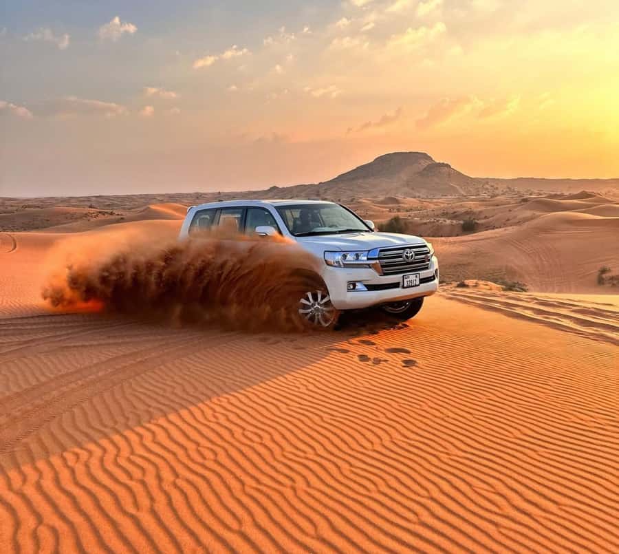Doha: Inland Sea Desert Safari with Sunset & Sunrise Views - Sandboarding, swimming, and the short stop at the Inland Sea