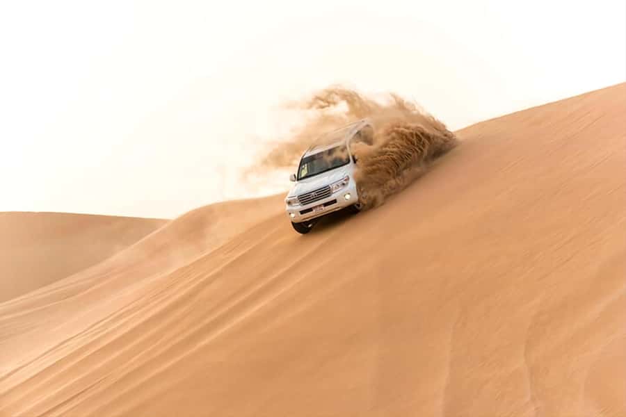 Doha: inland sea Tour With Dune Bashing &Sandboarding fun - Timing, pickup, and practical details