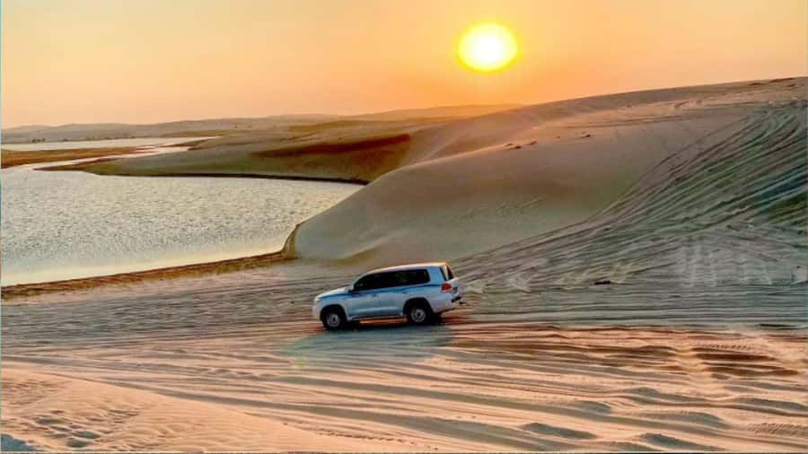Doha: InlandSea Tour,Camel,Sand Boarding With All Activities - From Doha to the dunes near Mesaieed