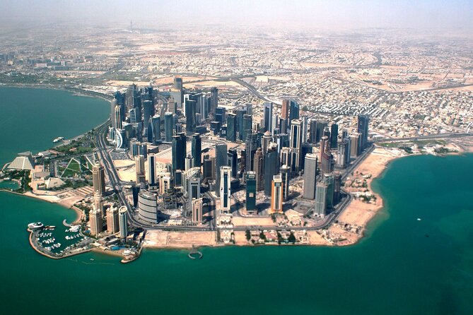 Doha Night City Tour With Pickup From Doha airport and Hotels - A quick nighttime introduction to Doha