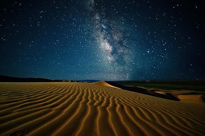 Doha Night Desert Safari Stargazing Camel Ride and Dune Bashing - Sandboarding and dune driving at Ash Shaqra’