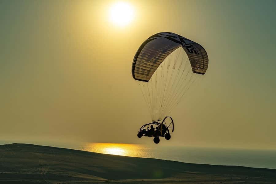 Doha: Paratrike Air Tour with Hotel Pickup and Drop-off - What the paratrike flight feels like above Sealine