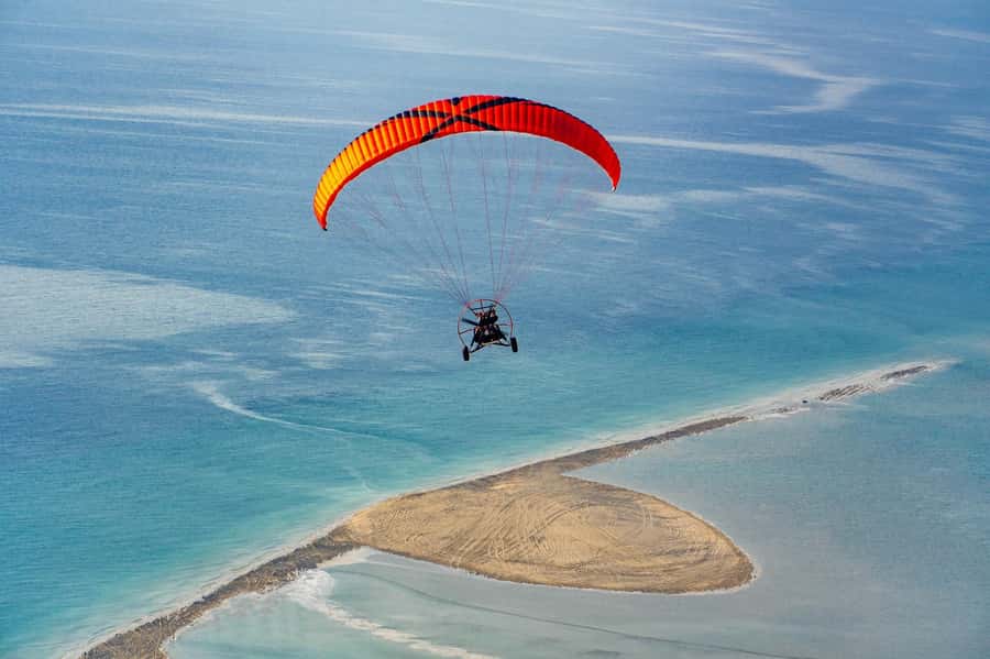 Doha: Paratrike Air Tour with Hotel Pickup and Drop-off - Seeing desert and beach from an open-air seat