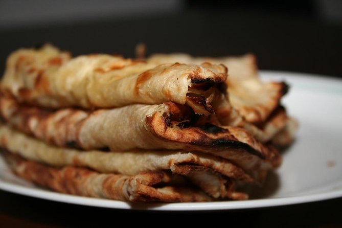 Doha: Pearl Island Food Tour – 7 Tastings, AC Vehicle - Karak and chapati beside Porto Arabia