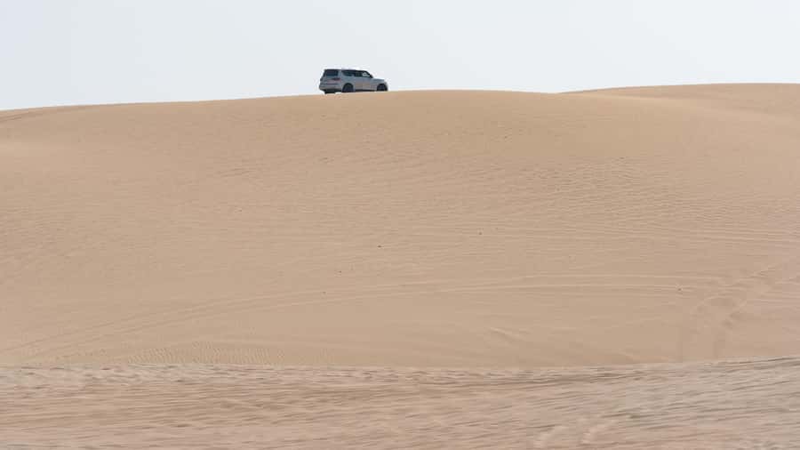 Doha Private Desert Safari, inland sea, sand boarding - Sandboarding and the first dunes