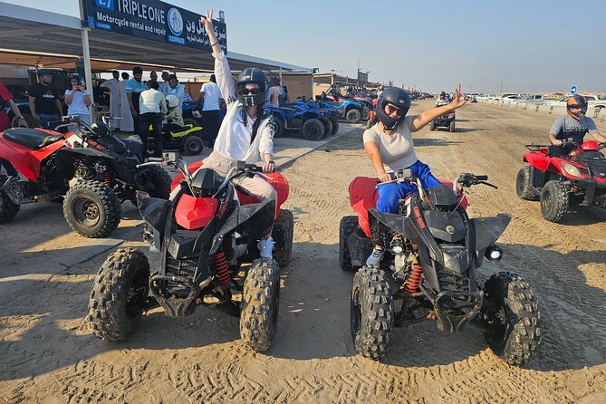 Doha Qatar ATV Quad Bike Buggy Dune Bashing and Camel Ride - Dune bashing toward Qatar’s Inland Sea