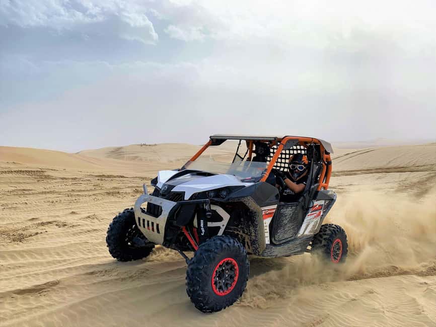Doha Qatar Buggy ride, camel ride, dune bashing, sandboard. - A short camel ride and a slower view of the desert