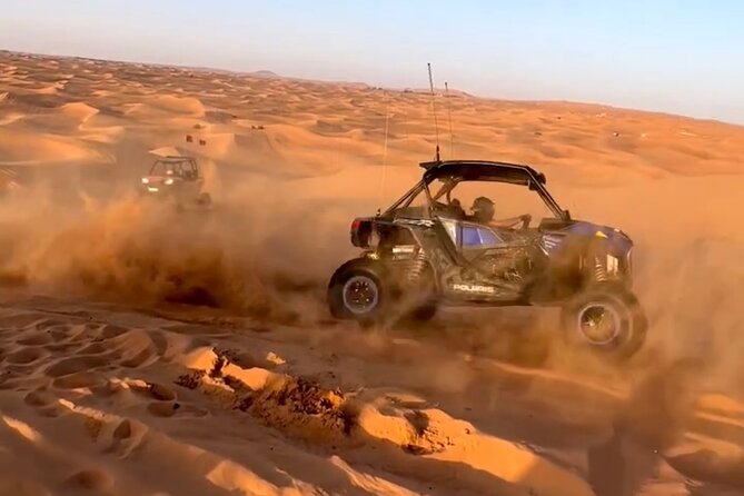 Doha, Qatar: Desert Safari, Inland sea and Camel Ride Adventure. - Sandboarding turns a dune into a short thrill ride