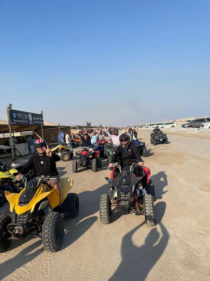 Doha: Quad Bike, Desert Safari, Buggy ride & inland sea tour - Camel ride and falcon photos
