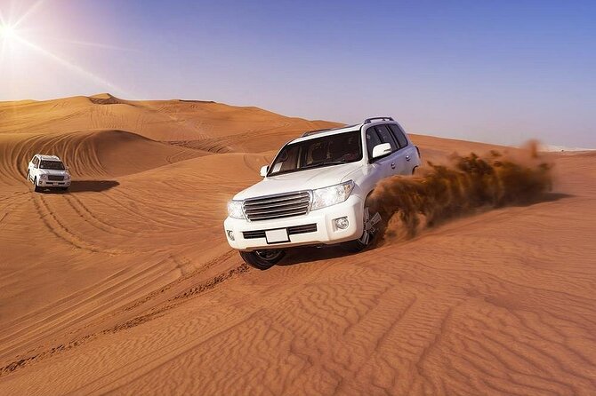 Doha: Quad Bike, Dune Bashing, Camel Ride & Inland Sea Tour - Dune bashing in a 4WD Toyota