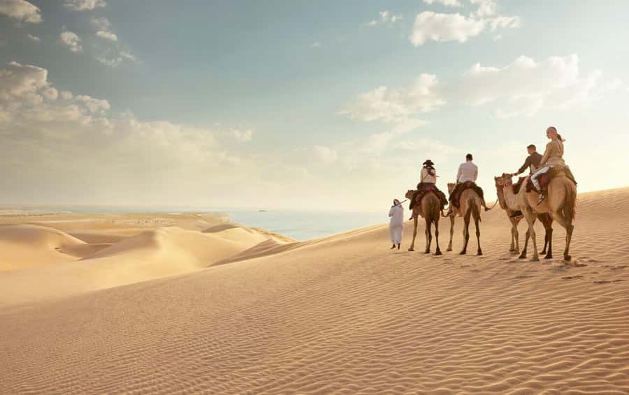 Doha: Safari, Camel Ride, Sandboarding and Inland Sea Tour - Tea, photos, and the human side of the trip