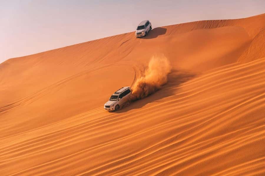 Doha Safari Quadbike, CamelRide, Sandboarding & Inland Sea - Guides, languages, and group style