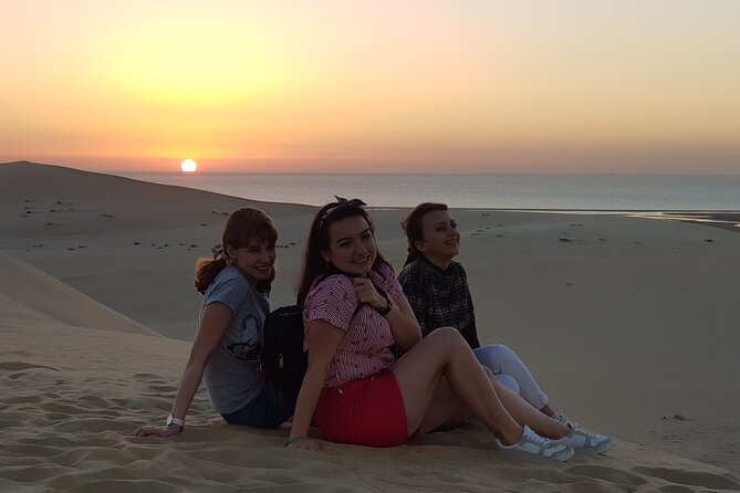 Doha: Sunrise /Sunset Desert Safari with Sand Boarding,Camel ride - From Doha to the sand at Sealine Beach