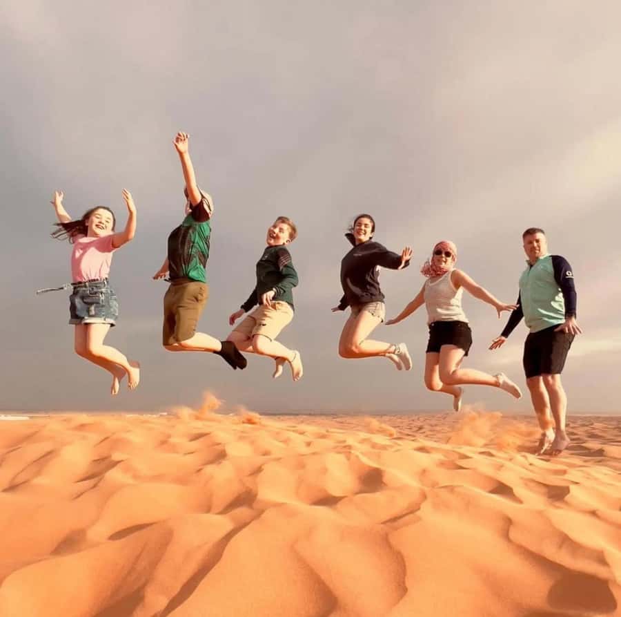 Doha: Sunset Desert Safari with Camel Ride & Sandboarding - A short camel ride with Bedouin context