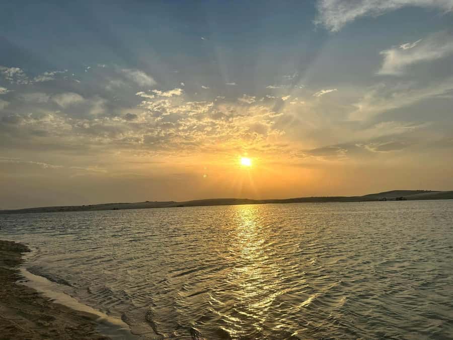 Doha: Sunset desert tour with Camel Ride, Inland Sea & Tea - A 10-minute camel ride near Mesaieed
