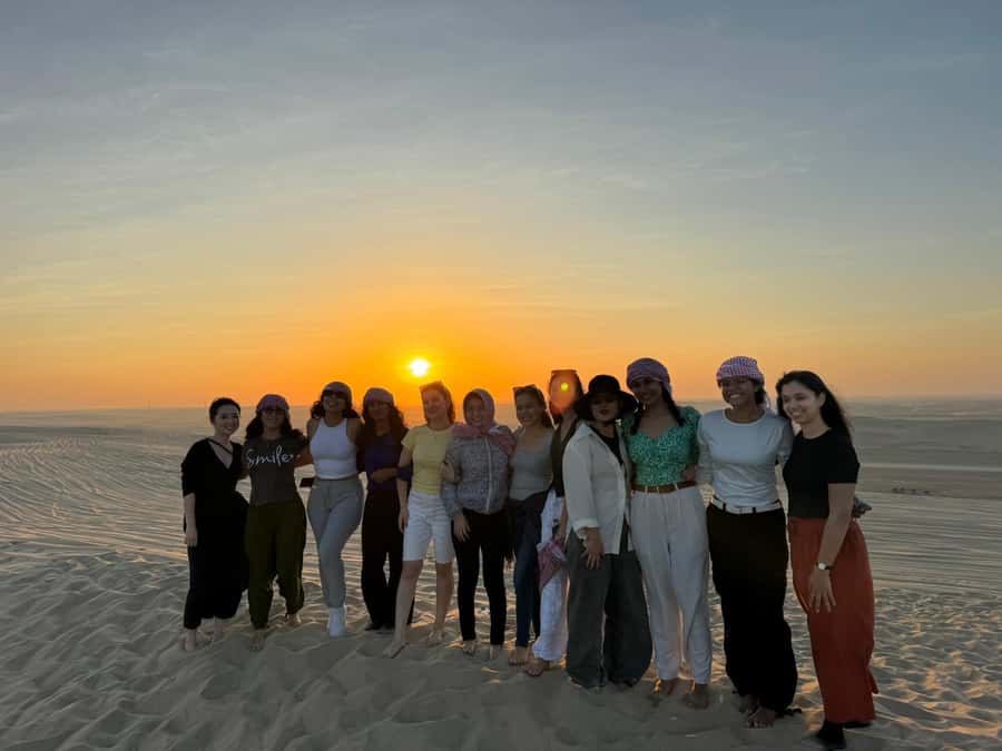 Doha: Sunset Safari, Dune Bashing, Sandboarding & Camel Ride - Sunset by the Inland Sea