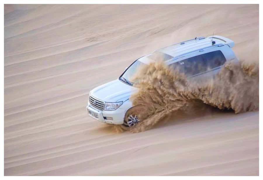 Dune Bashing, Sandboarding, Camel Ride & Optional ATV Ride - The ride from Doha to the desert