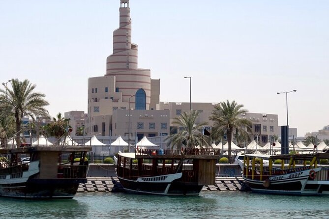 Explore Heart of Qatar Doha City Tour with Professional Guide - Souq Waqif, falcons, and old-market atmosphere