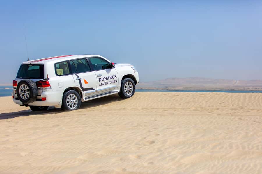 From Doha: 8-hour Safari Tour with Desert Beach Experience - From Doha to the dunes in a private Land Cruiser