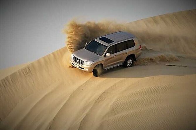 Half Day Desert Safari and Inland Sea - Dune bashing in a four-wheel drive